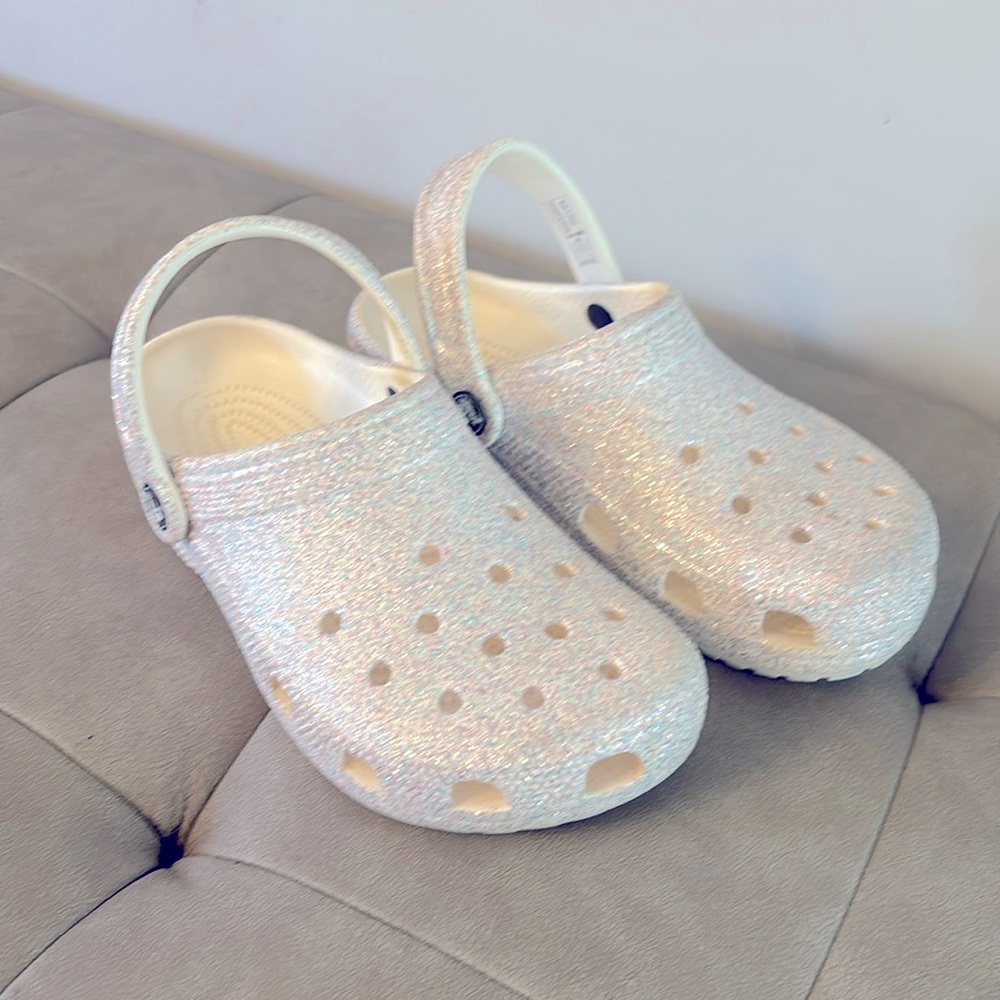 WORN ONCE, they are sparkly purple/white/ aqua sparkles.